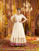 Beautiful white Lehenga with mirror work blouse
